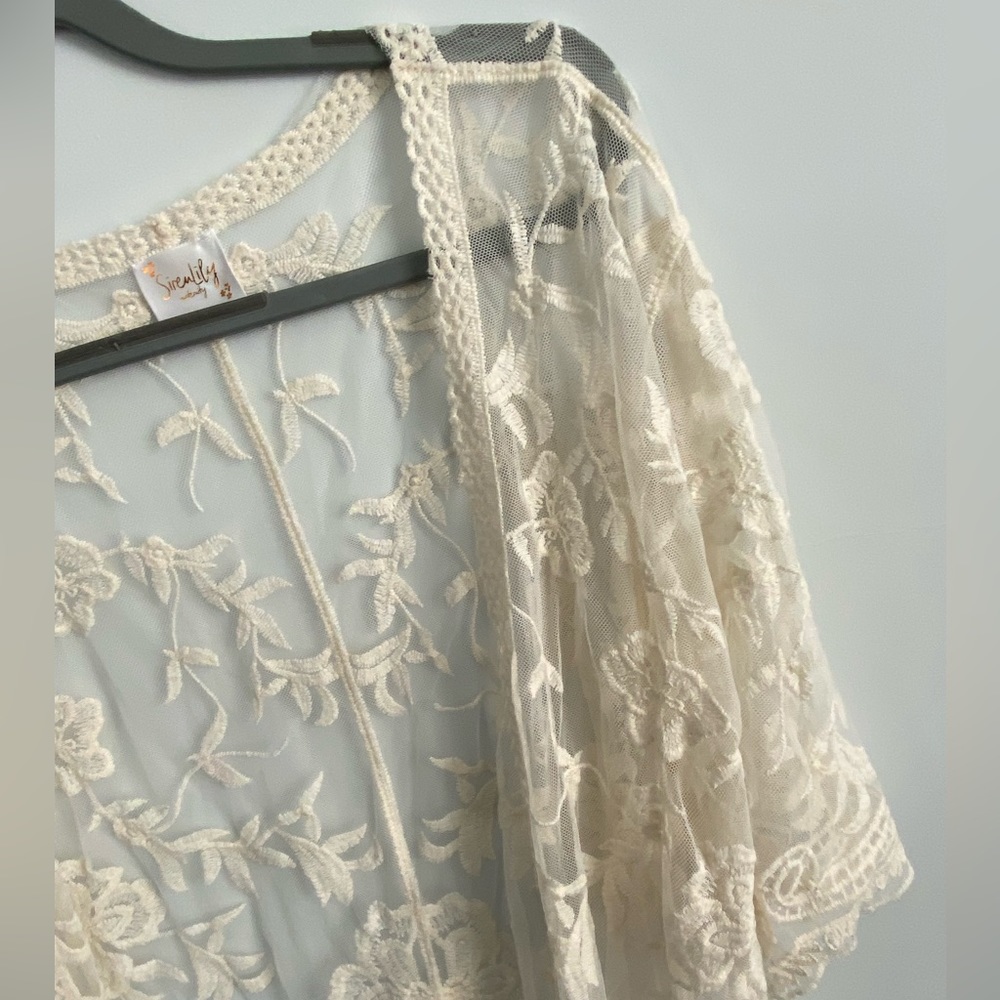 Lacy shrug, perfect to jazz up a simple dress!